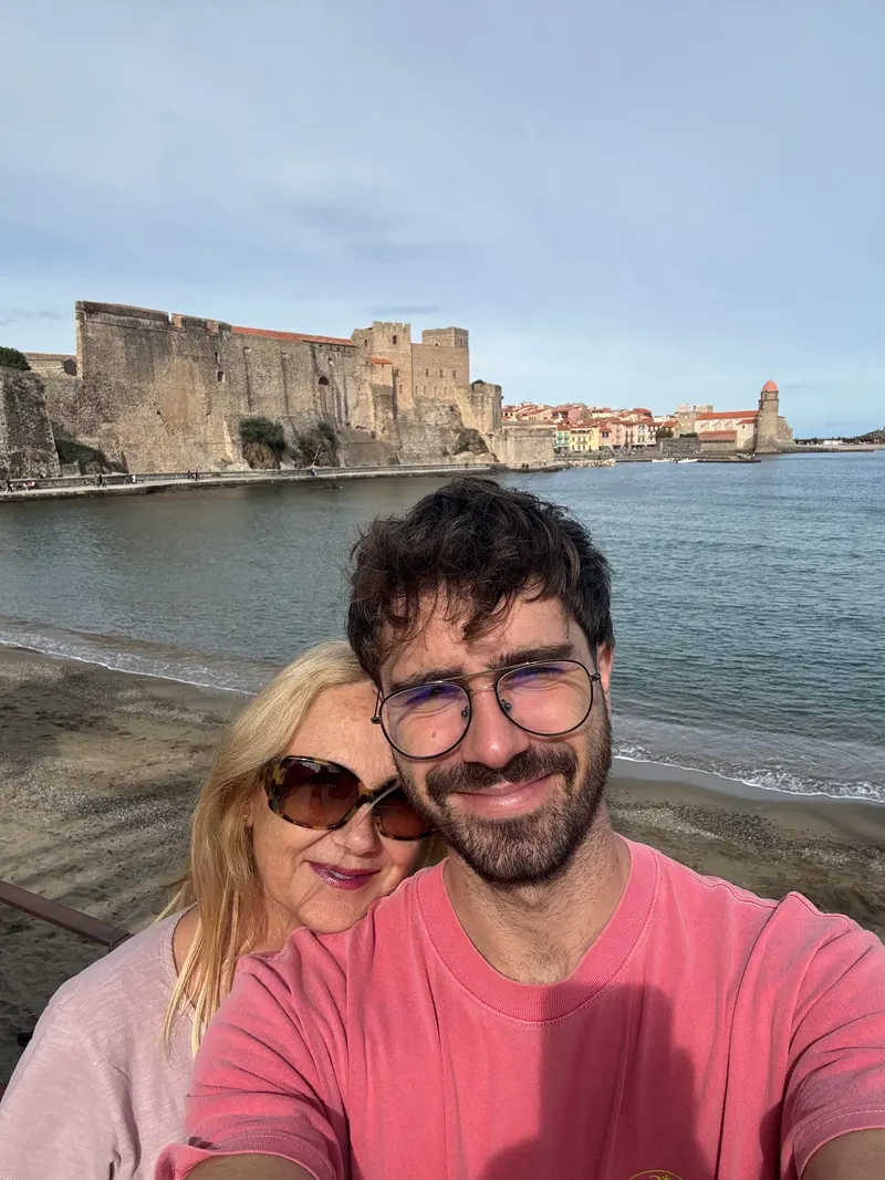 Selfie with a view of Collioure's castle and church behind