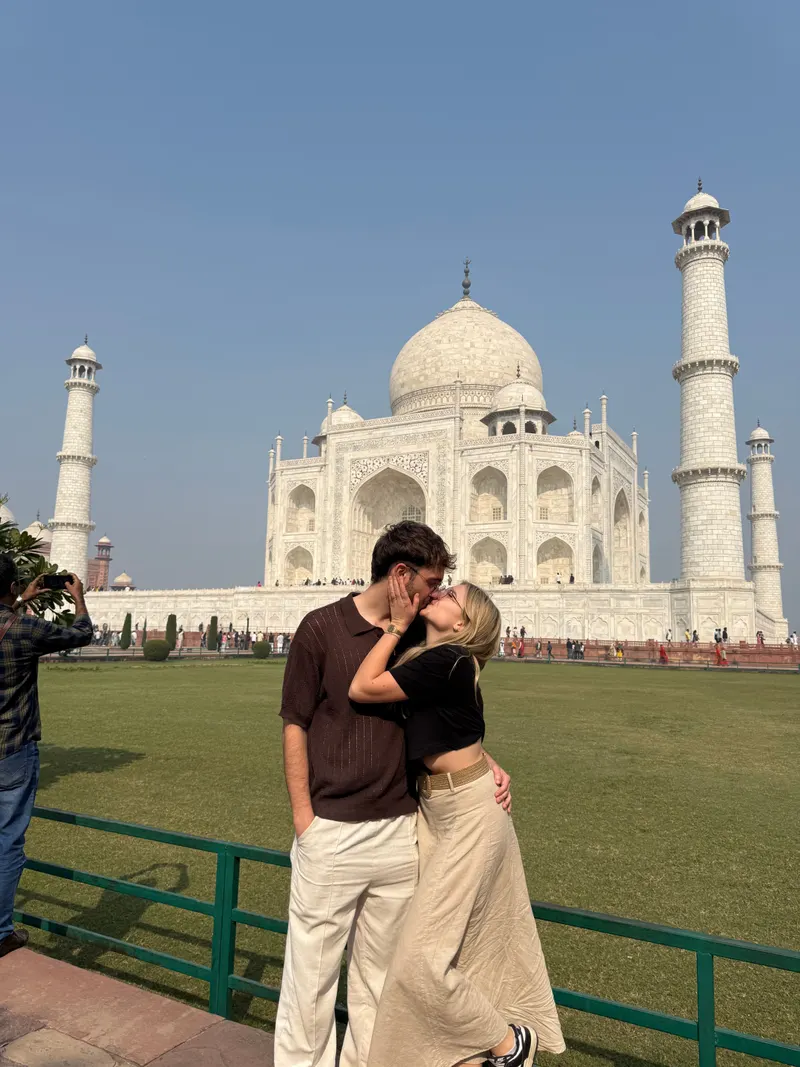 Standing kiss at Taj Mahal