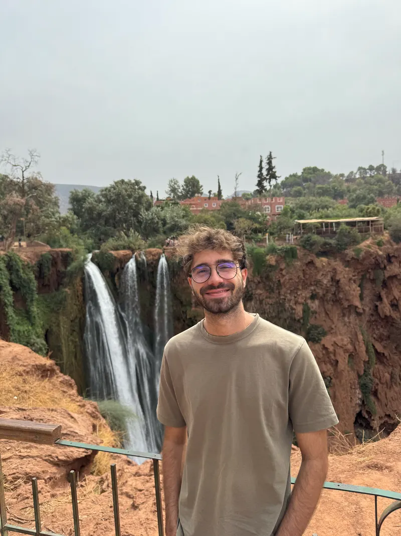 Smiling in front of Ouzoud Falls