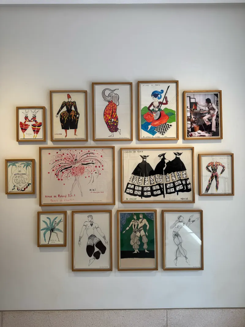 Wall of Yves Saint Laurent paintings inside the museum at Jardin Majorelle