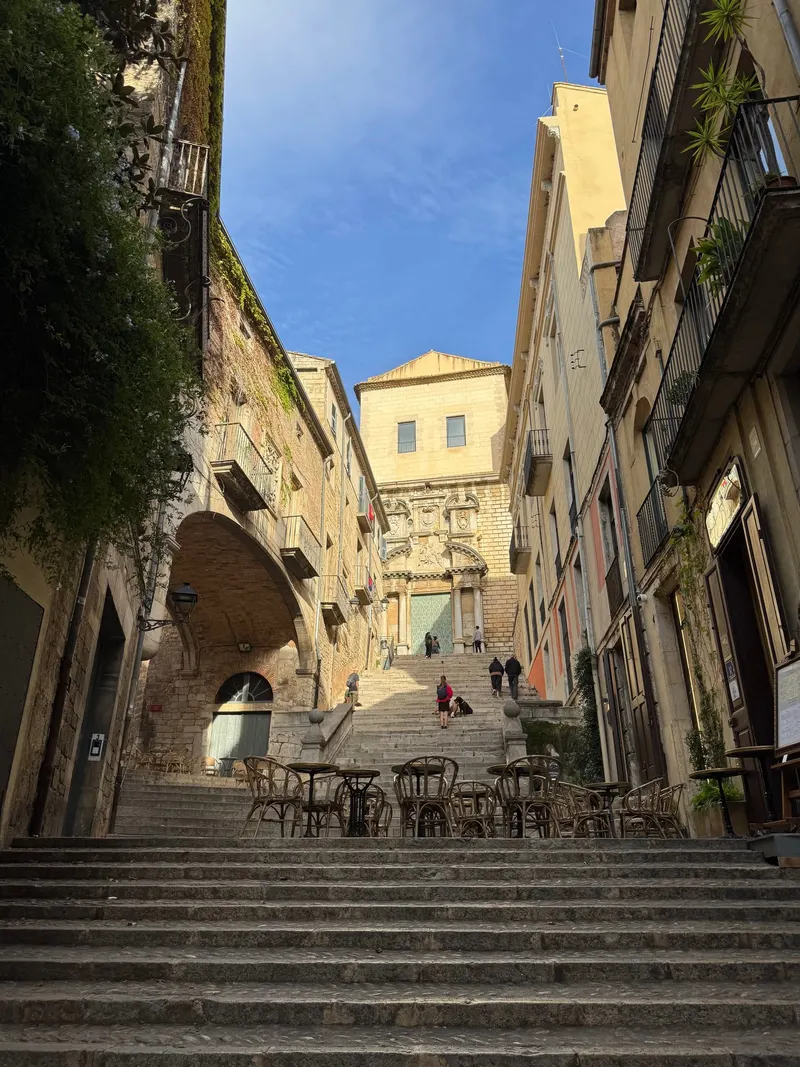 The church of Sant Martí in Girona seen from the bottom of its steps