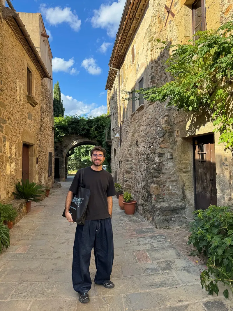 Standing on a street in Monells on a sunny day