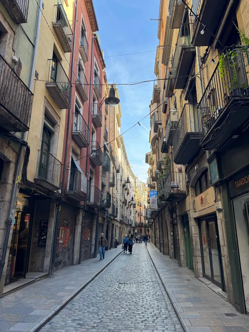 A quiet street in Girona's old town with no tourists