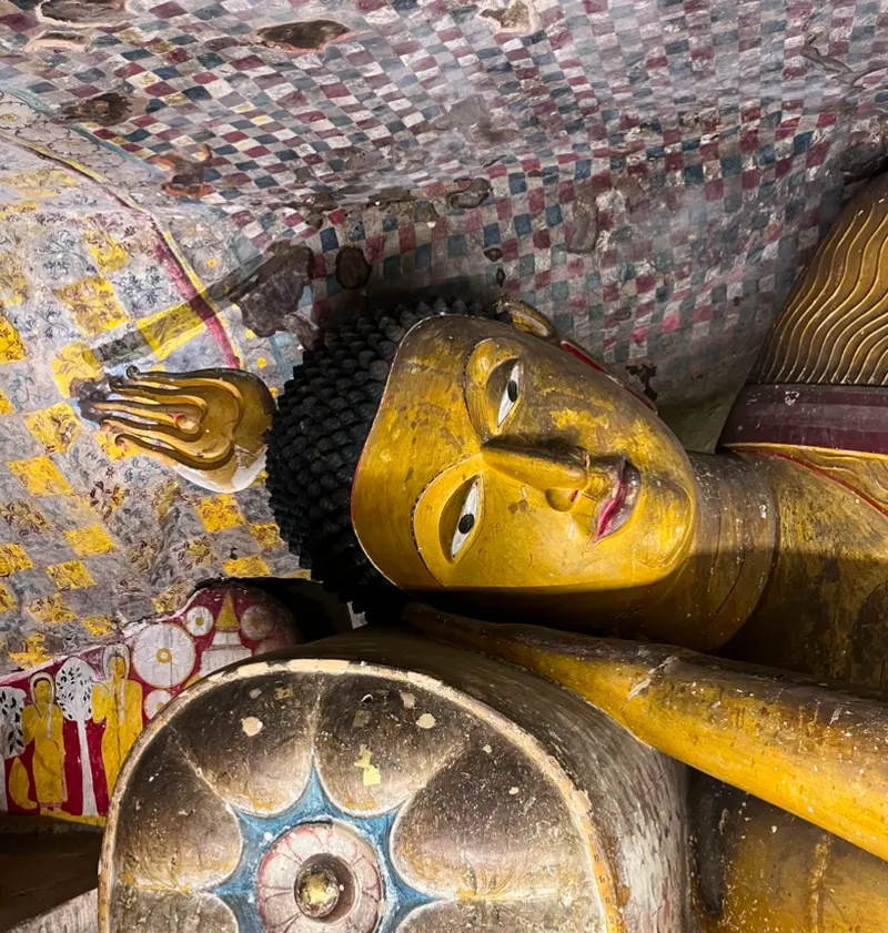 Reclining Buddha statue in Dambulla Caves