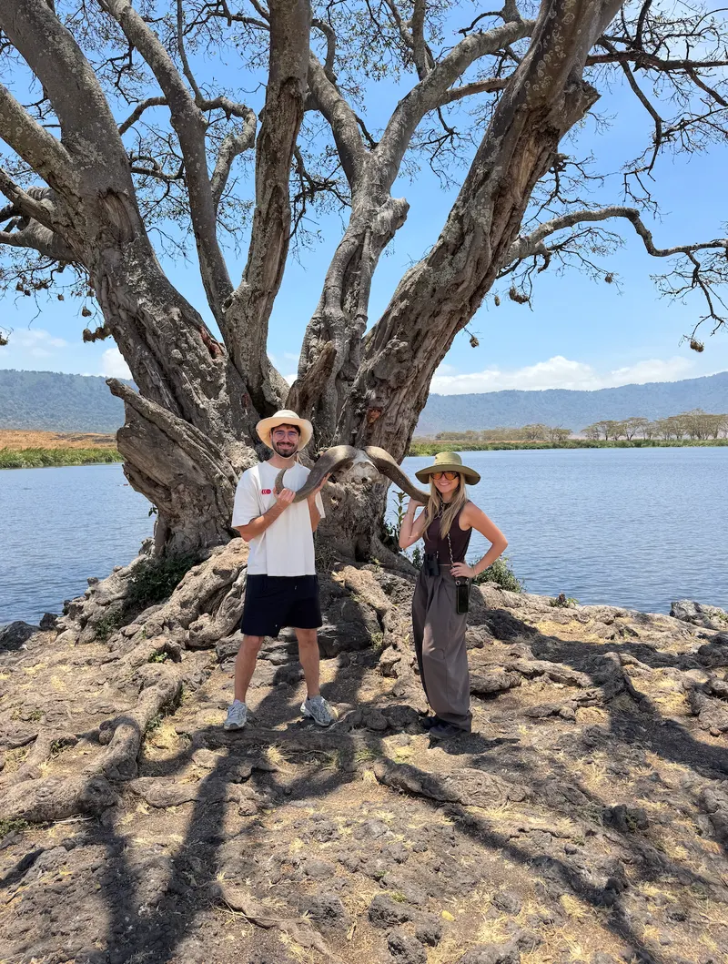 Holding a buffalo skull in Ngorongoro Crater National Park Tanzania