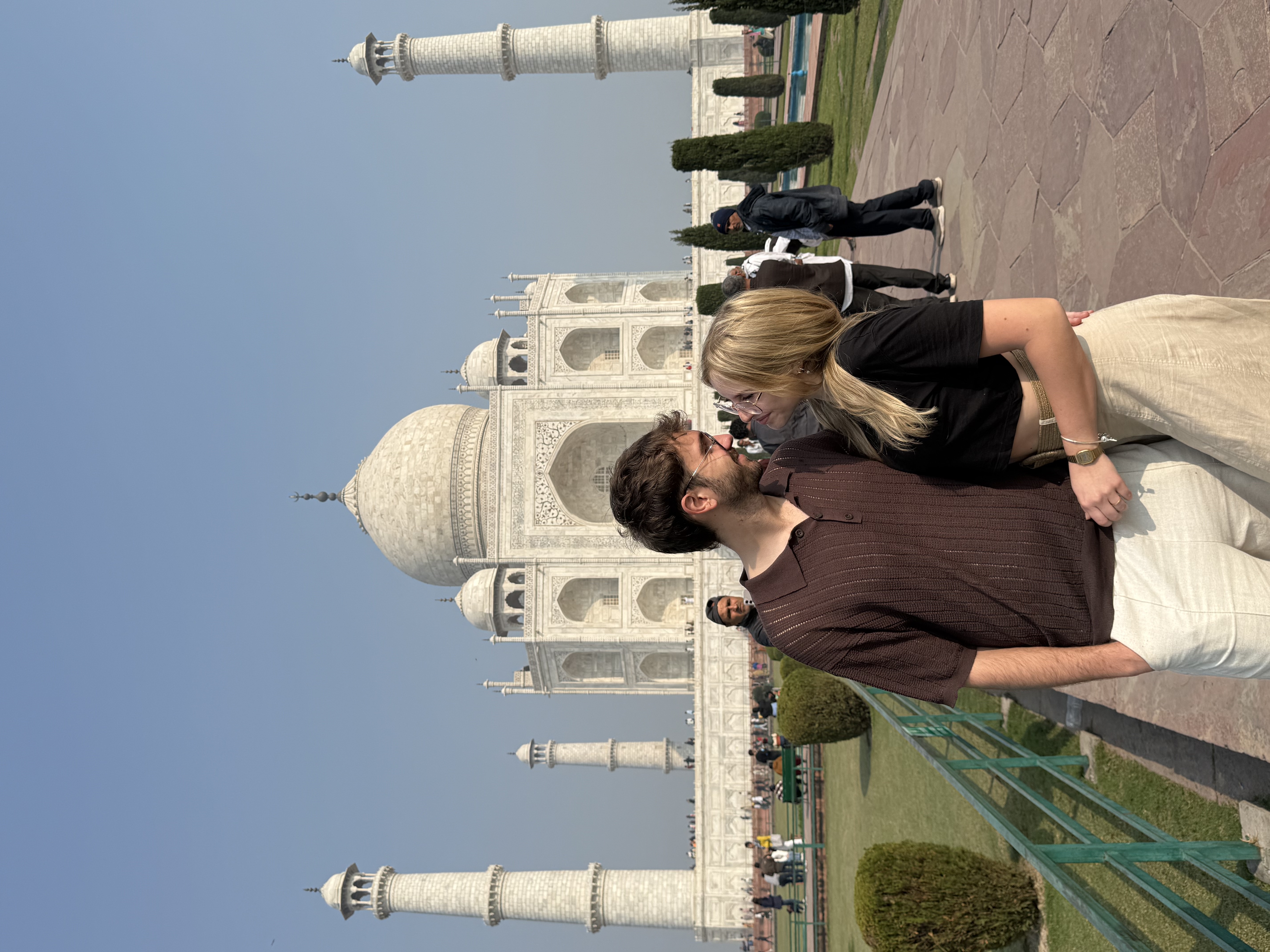 Standing in front of the Taj Mahal