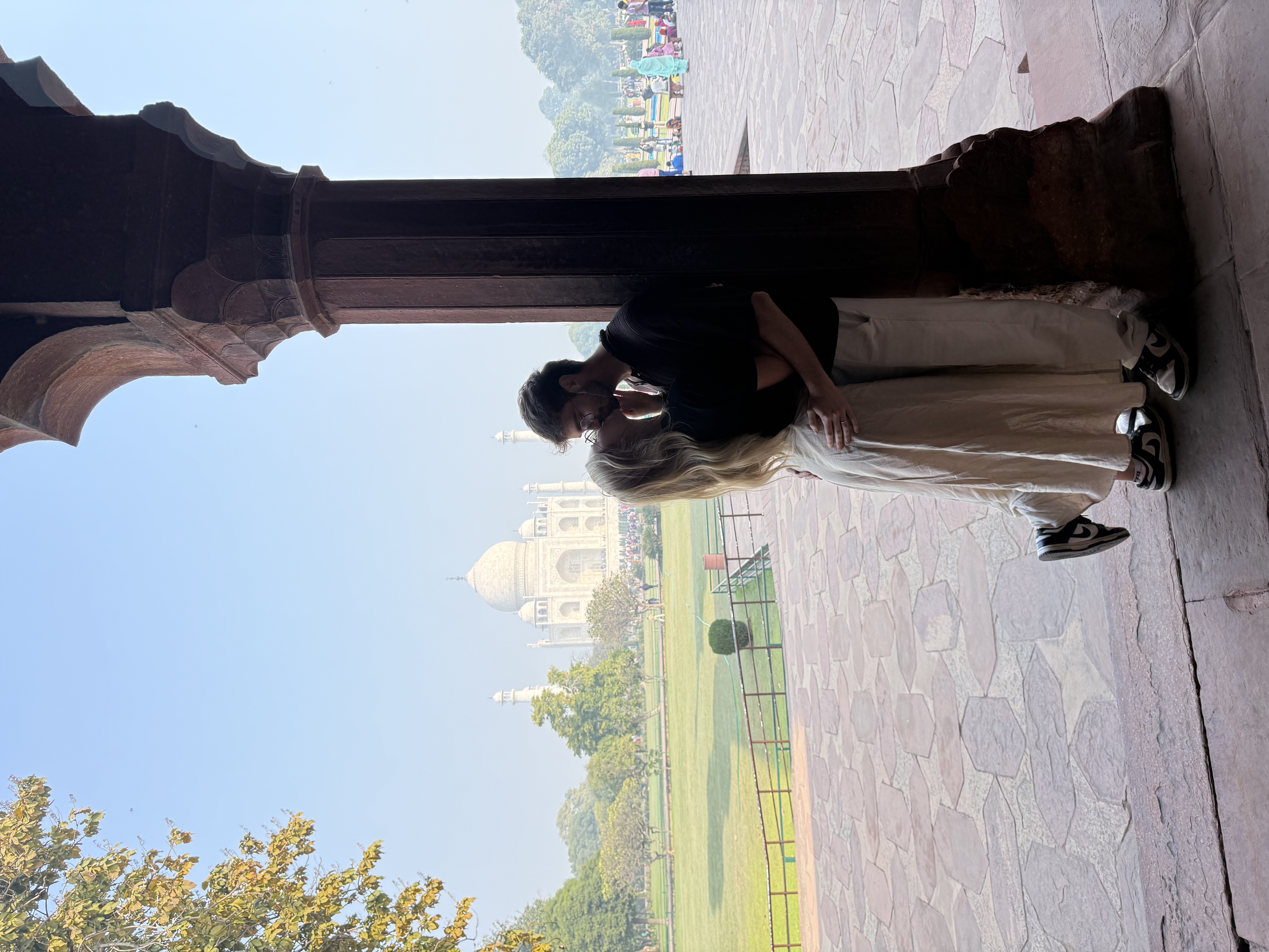 Kissing in front of the Taj Mahal