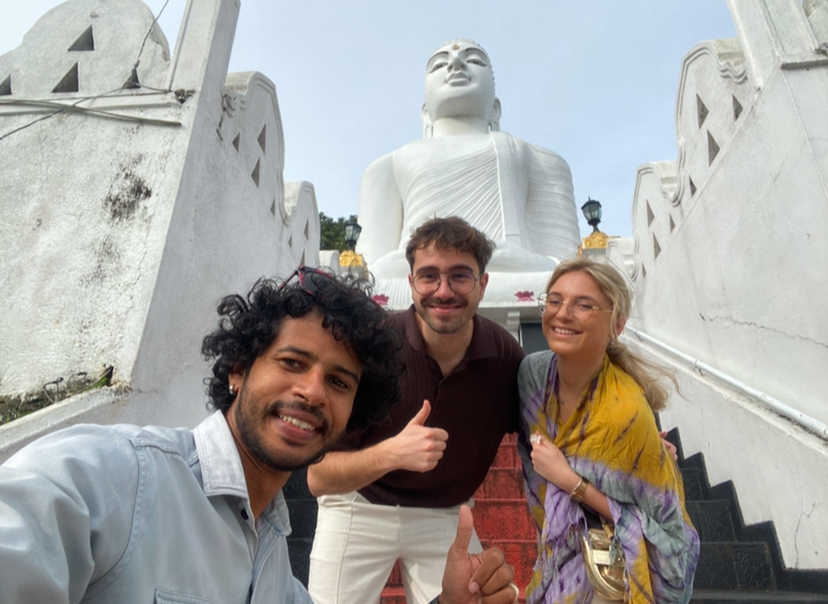 Selfie with our guide in front of Sri Maha Bodhi Viharaya