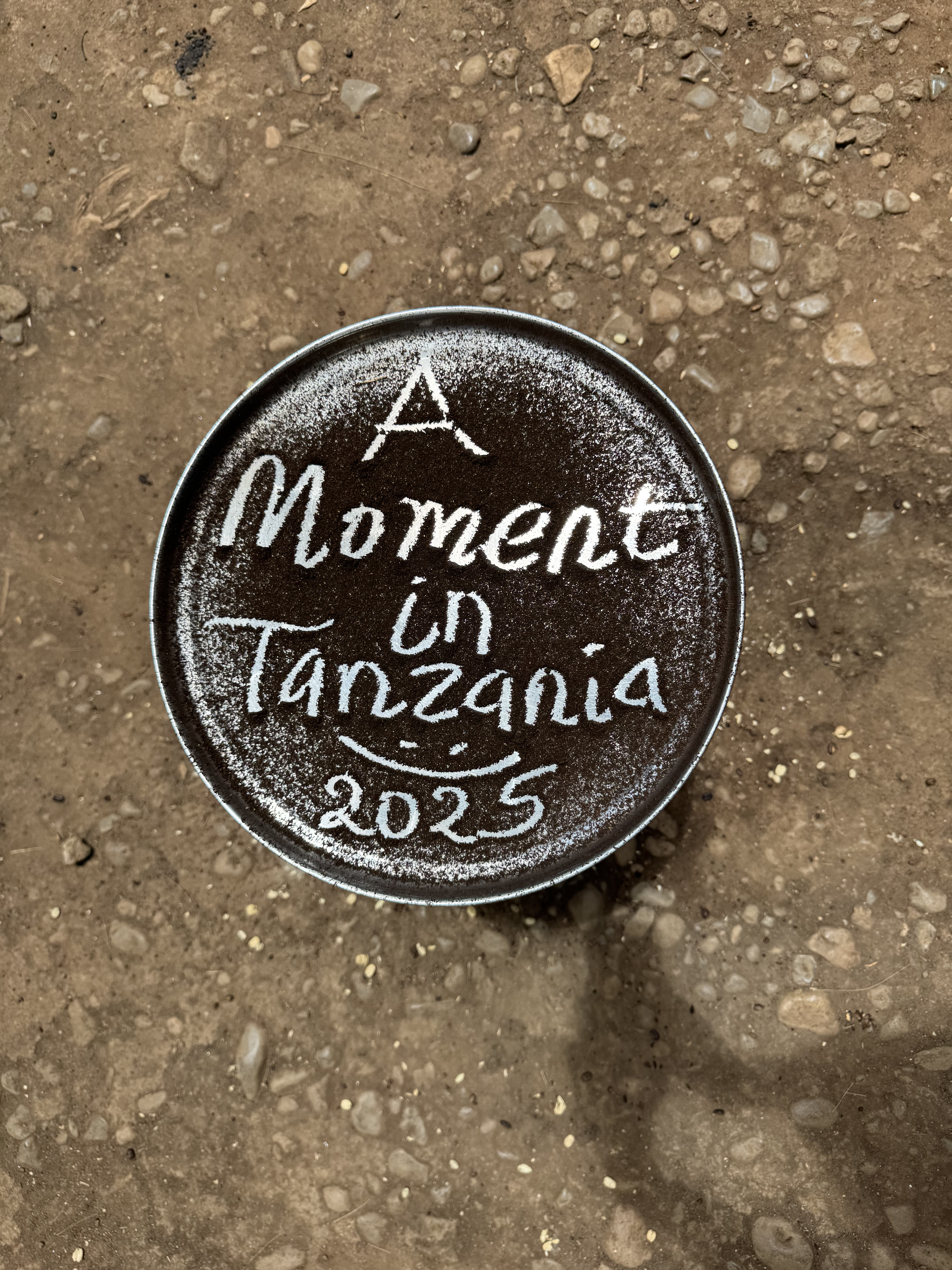 A Moment in Tanzania 2025 written with ground coffee